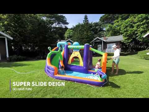 Summer fun for the kids playing on the water slide in the backyard!
