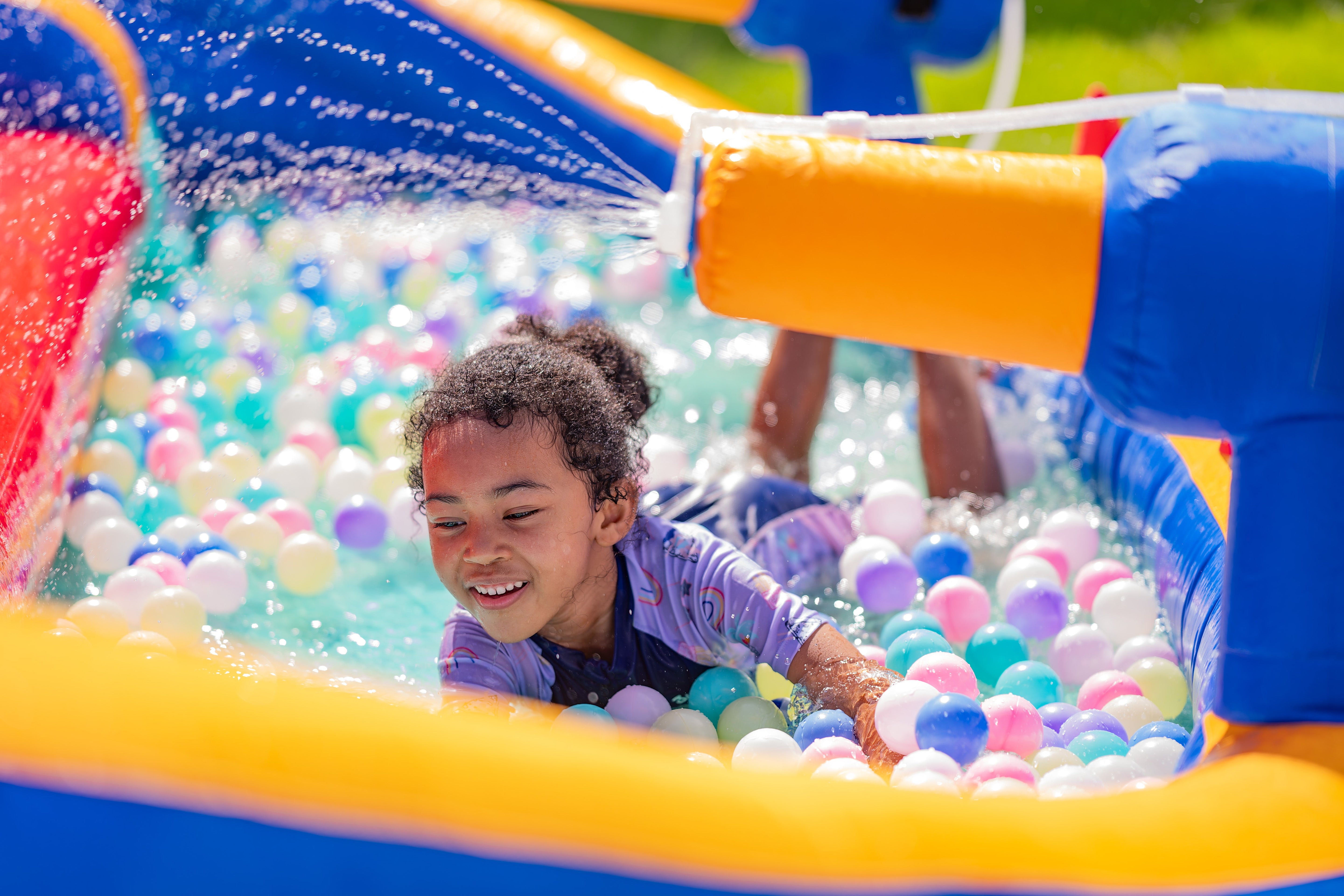 Why a Water Slide Bounce House Brings Kids (and Parents) Together